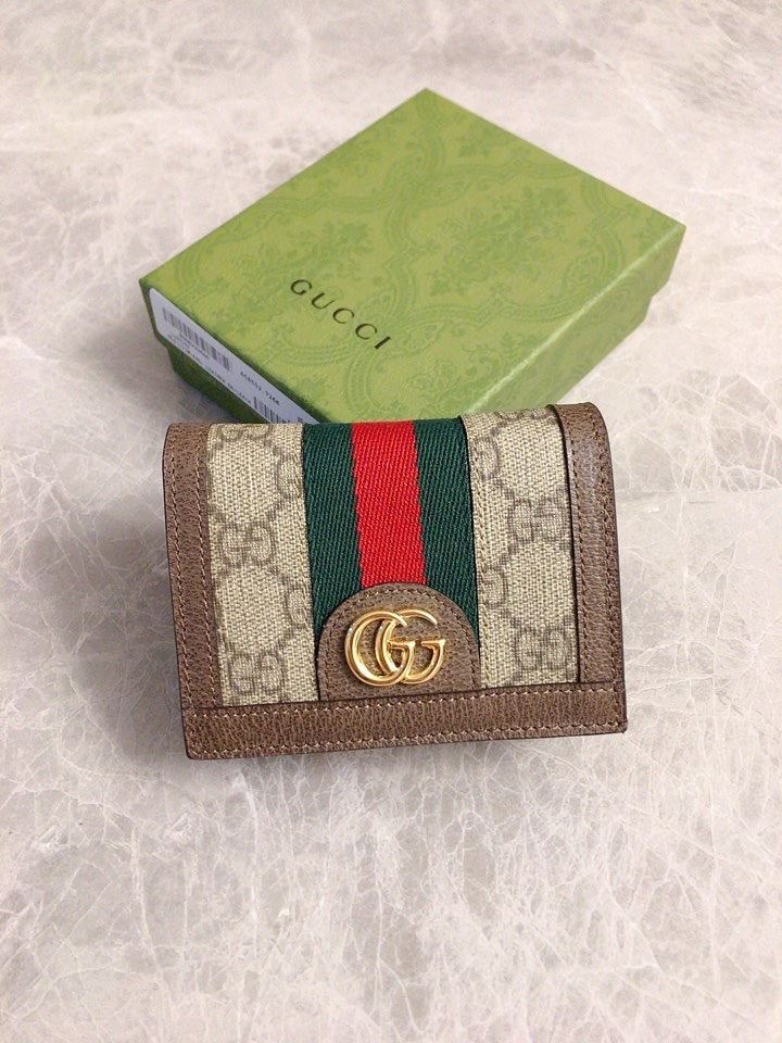 G*u*i wallets & purse